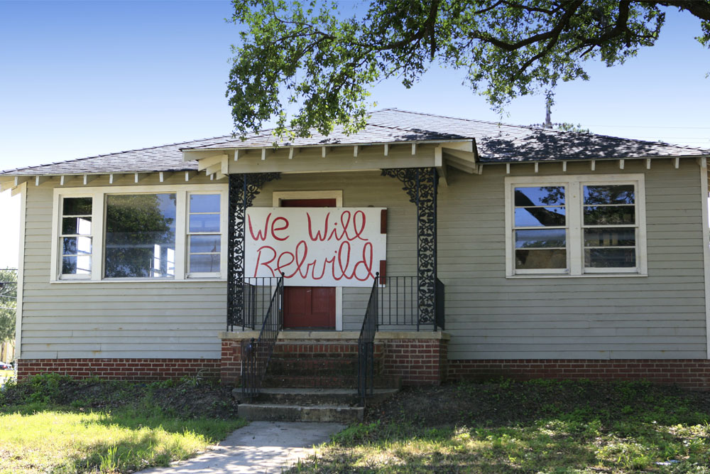 we-will-rebuild House damaged in hurricane Katrina